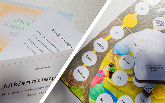 Arbeitsheft und Karton sowie bunter Spielplan und Kärtchen auf Tisch