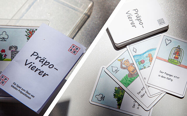 Spielanleitung und buntes Kartenspiel auf Tisch